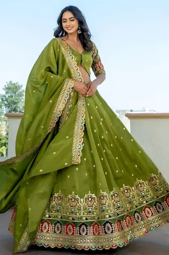 Dazzling Green Thread Embroidered Silk Mehendi Wear Lehenga Choli