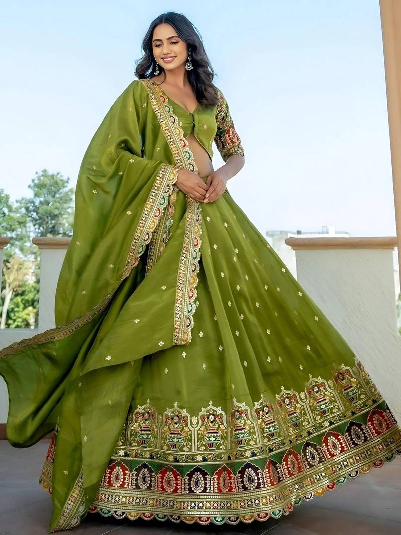 Dazzling Green Thread Embroidered Silk Mehendi Wear Lehenga Choli