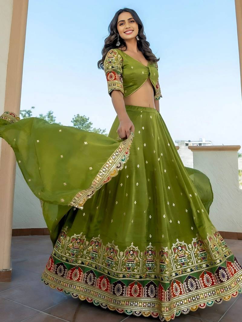 Dazzling Green Thread Embroidered Silk Mehendi Wear Lehenga Choli