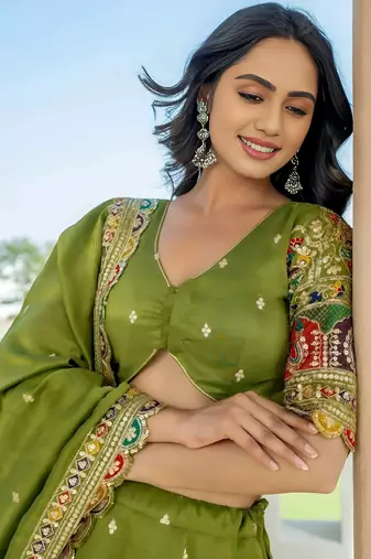 Dazzling Green Thread Embroidered Silk Mehendi Wear Lehenga Choli