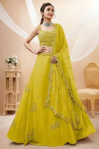 Adorable Neon Yellow Sequins Georgette Wedding Wear Lehenga Choli