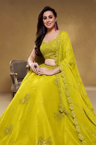 Adorable Neon Yellow Sequins Georgette Wedding Wear Lehenga Choli