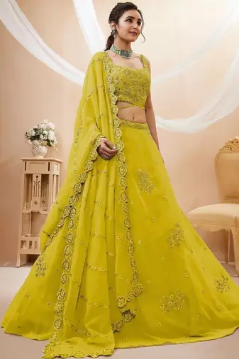 Adorable Neon Yellow Sequins Georgette Wedding Wear Lehenga Choli