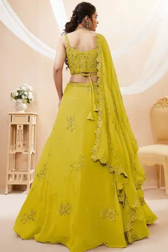 Adorable Neon Yellow Sequins Georgette Wedding Wear Lehenga Choli