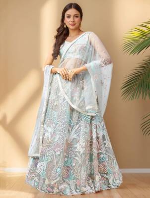 Spectacular Pista Green Sequins Net Wedding Wear Lehenga Choli 1