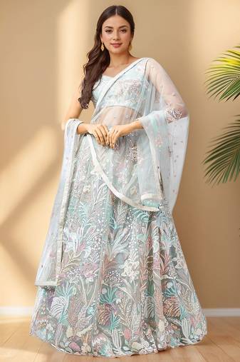 Spectacular Pista Green Sequins Net Wedding Wear Lehenga Choli