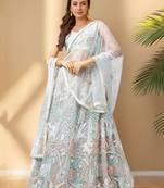 Spectacular Pista Green Sequins Net Wedding Wear Lehenga Choli