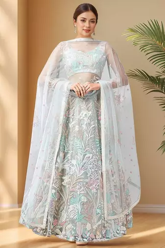 Spectacular Pista Green Sequins Net Wedding Wear Lehenga Choli