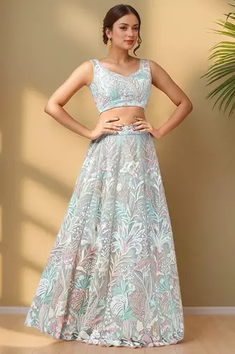 Spectacular Pista Green Sequins Net Wedding Wear Lehenga Choli