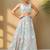 Spectacular Pista Green Sequins Net Wedding Wear Lehenga Choli