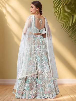 Spectacular Pista Green Sequins Net Wedding Wear Lehenga Choli 4