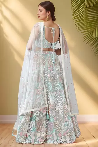 Spectacular Pista Green Sequins Net Wedding Wear Lehenga Choli
