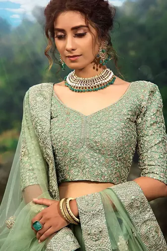 Green Zari Worked Soft Net Wedding Wear Lehenga Choli