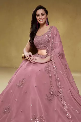 Attractive Dusty Pink Sequins Georgette Party Wear Lehenga Choli