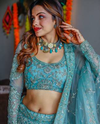 Stunning Aqua Blue Embroidered Soft Net Occasion Wear Lehenga Choli 3