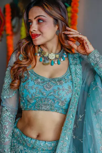 Stunning Aqua Blue Embroidered Soft Net Occasion Wear Lehenga Choli