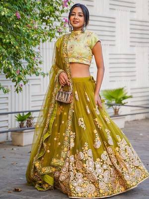 Ravishing Green Mirror Embroidered Net Reception Wear Lehenga Choli 1
