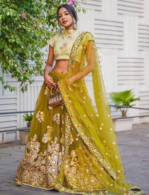 Ravishing Green Mirror Embroidered Net Reception Wear Lehenga Choli 2