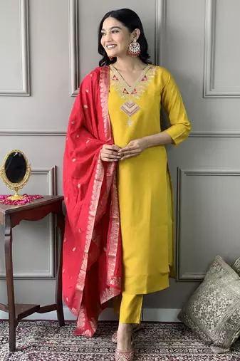 Yellow colored party wear embroidered stitched chanderi pant style kurti suit with duppatta