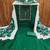 Women's dark green embroidered dress material