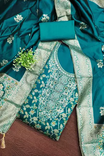 Women's teal handwork dress material