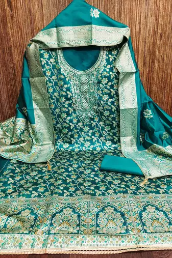 Women's teal handwork dress material