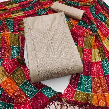 beige cotton dress material with embroidered design 2