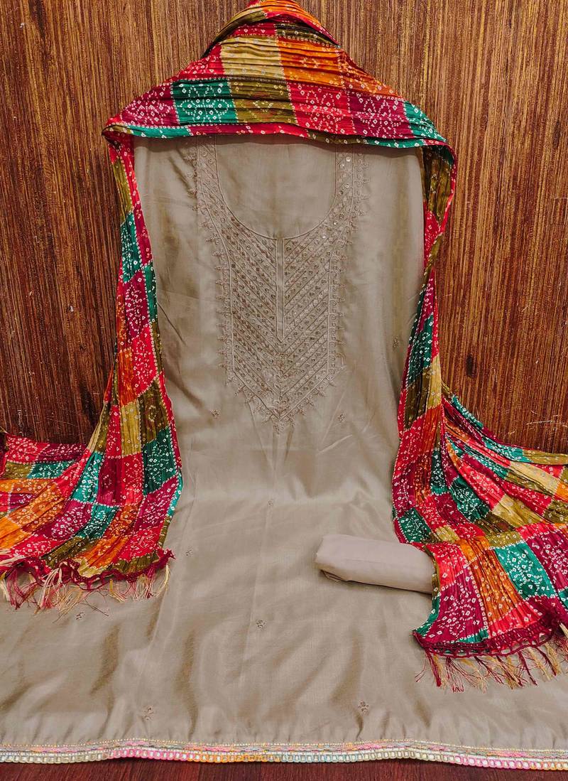 Women's beige embroidered dress material