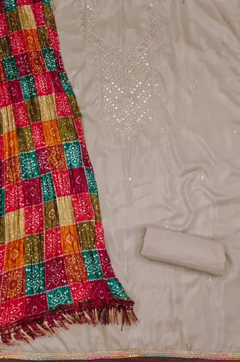 beige cotton dress material with embroidered design