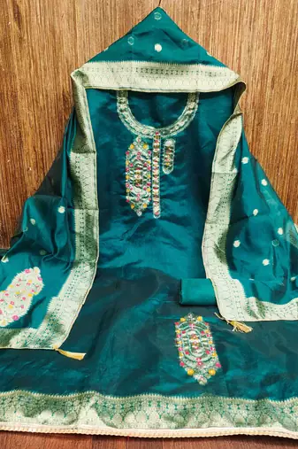 Women's teal handwork dress material