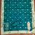 Women's teal handwork dress material