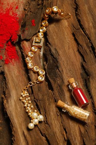 Gold plated silver beads kundan rakhi