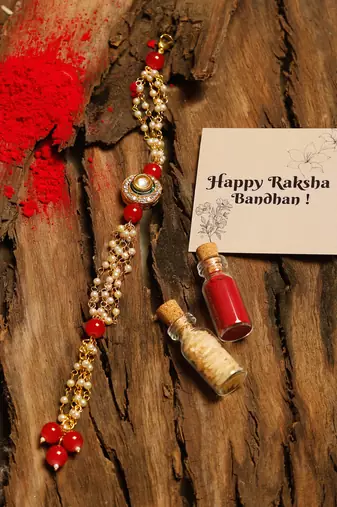 Red stone pearl kundan rakhi
