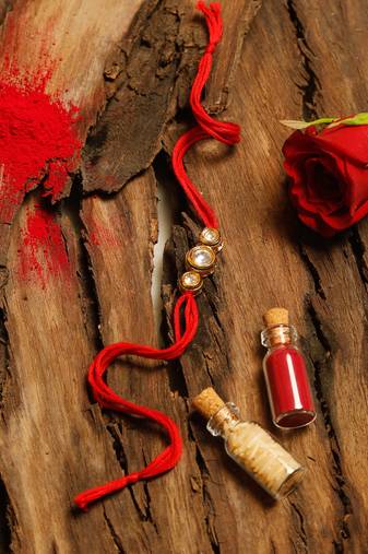 Gold plated thread rakhi