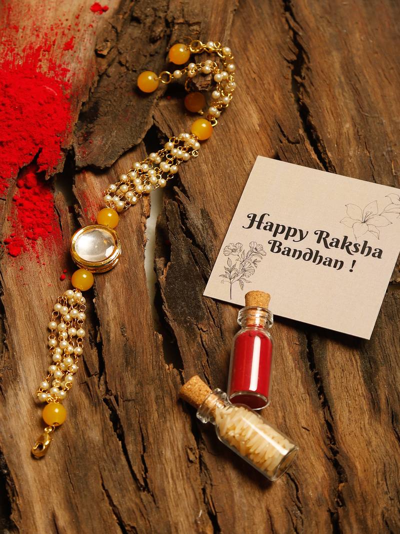 Yellow beaded kundan rakhi