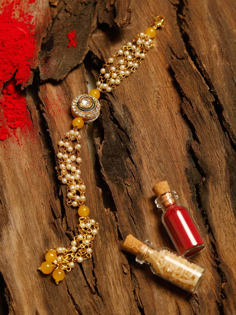Gold and yellow beaded kundan rakhi