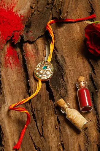Gold plated kundan thread rakhi