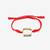 Red thread rakhi with stone
