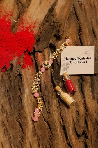 Pearl white beaded kundan rakhi