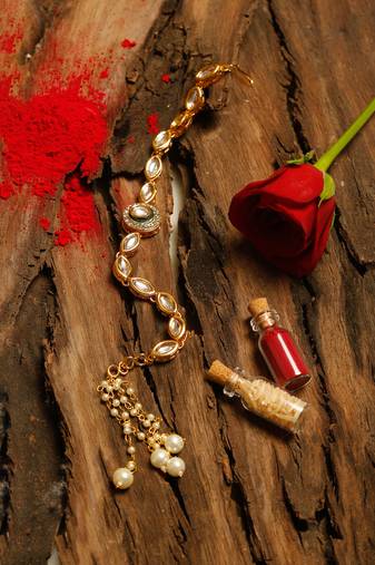 Gold tone kundan rakhi