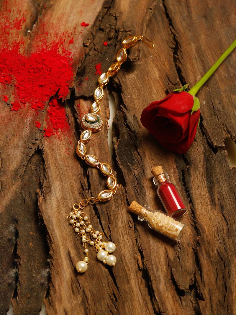 Gold tone kundan rakhi