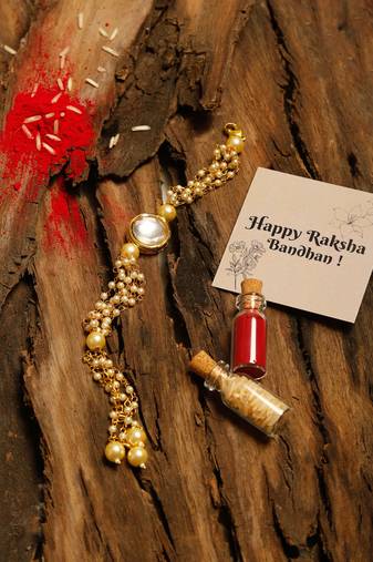 Peal white beaded kundan rakhi