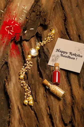 Peal white beaded kundan rakhi