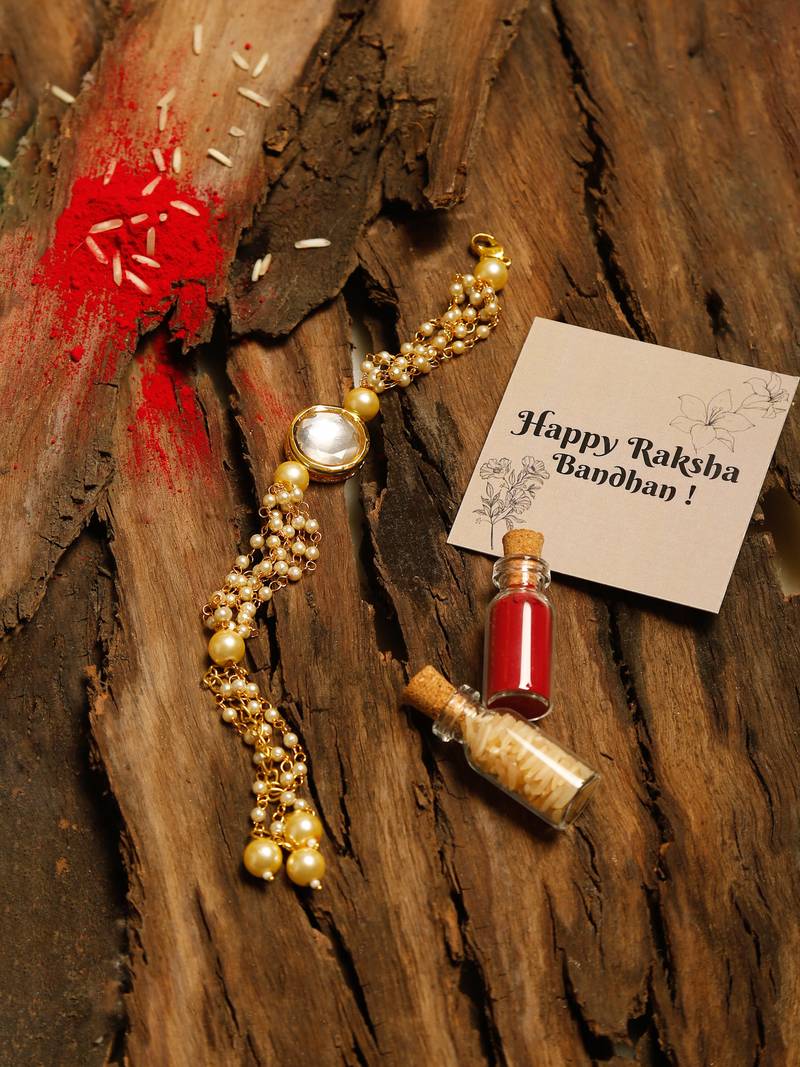 Peal white beaded kundan rakhi