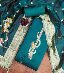 Women's teal handwork dress material
