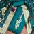 Women's teal handwork dress material