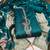 Women's teal handwork dress material