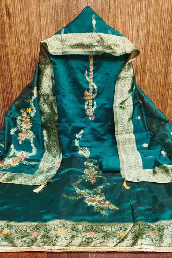 Women's teal handwork dress material
