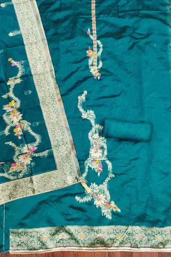 Women's teal handwork dress material
