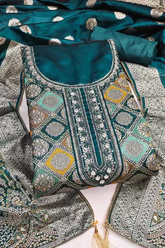 Women's teal handwork dress material